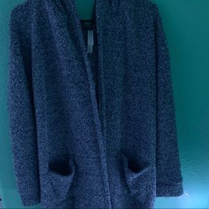 A long blue cardigan with pockets and a hood.
